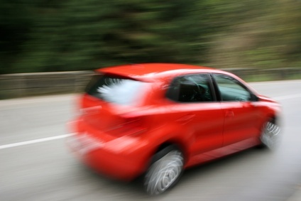 Volkswagen Leasing - automovil autos autoverkehr bewegung brennstoff depth of field draußen focus grau grün hell kraftfahrzeug modern moving niemand rascasielos raserei rot schnell straßen tage tageslicht vehicle verwischen.