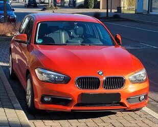 BMW BMW 118i in Valencia Orange mit HU bis 2026 Gebrauchtwagen