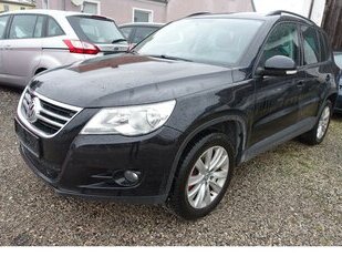 VW Tiguan Trend & Fun 4Motion PDC Navi Allwetterreife Gebrauchtwagen