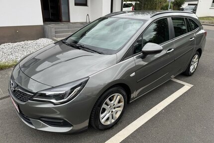 Opel Astra Klima Navi Temp CarPlay Bremse+ServNeu AHK Gebrauchtwagen